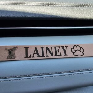 Photo of a PU leather bracelet with a photo of a dog named Lainey and text of the name and a paw print